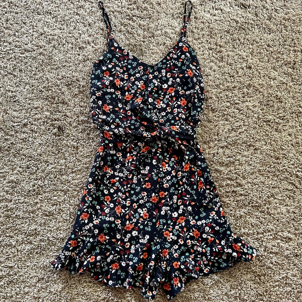 Small Navy Blue Romper with Floral Pattern